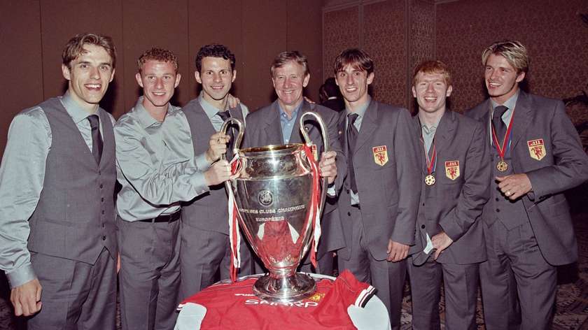 Some of the Class of 92, including Ryan Giggs, Gary Neville and Paul Scholes, pose with the Champions League trophy